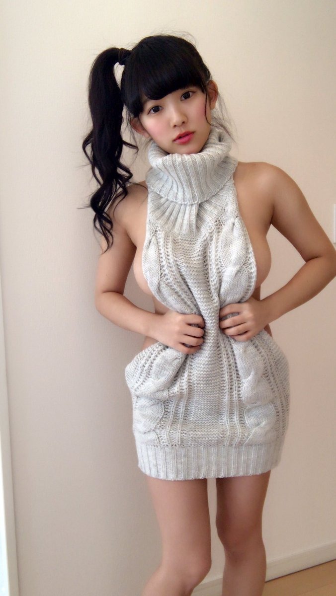 Girl with big breasts in a turtleneck