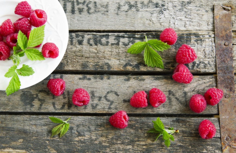 Flowers berries on a wooden table