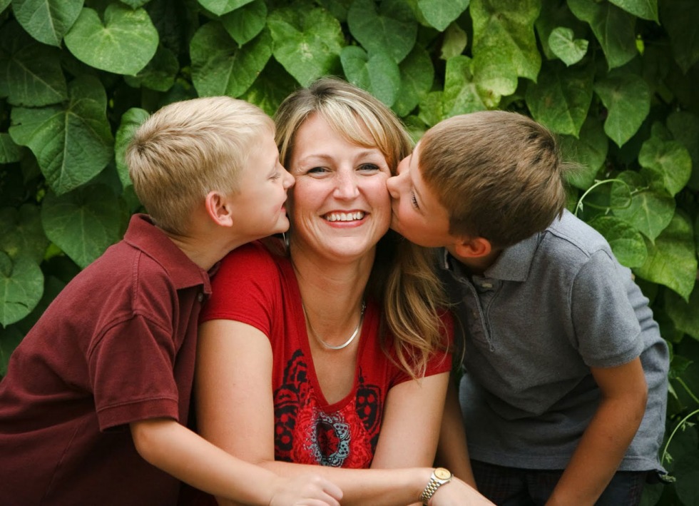 A woman carries a man