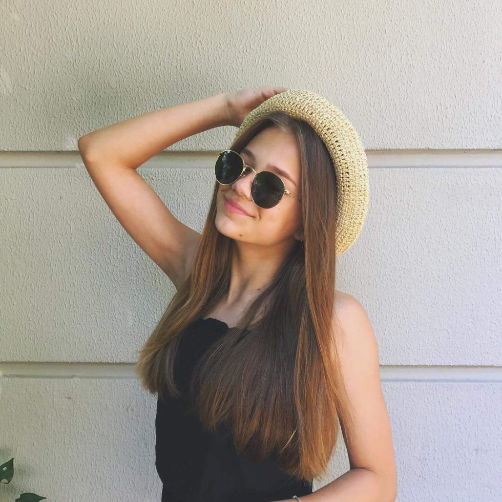 Katya Adushkina with glasses