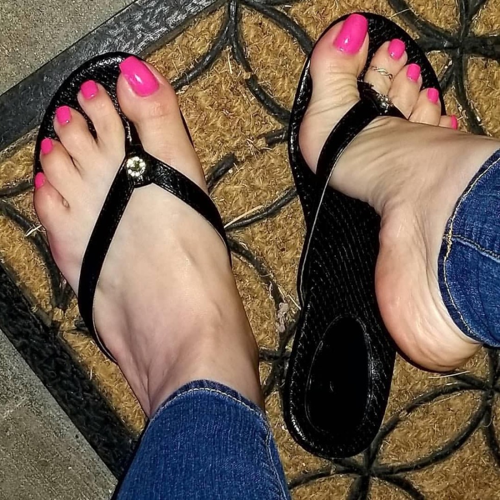 Beautiful female feet with a pedicure