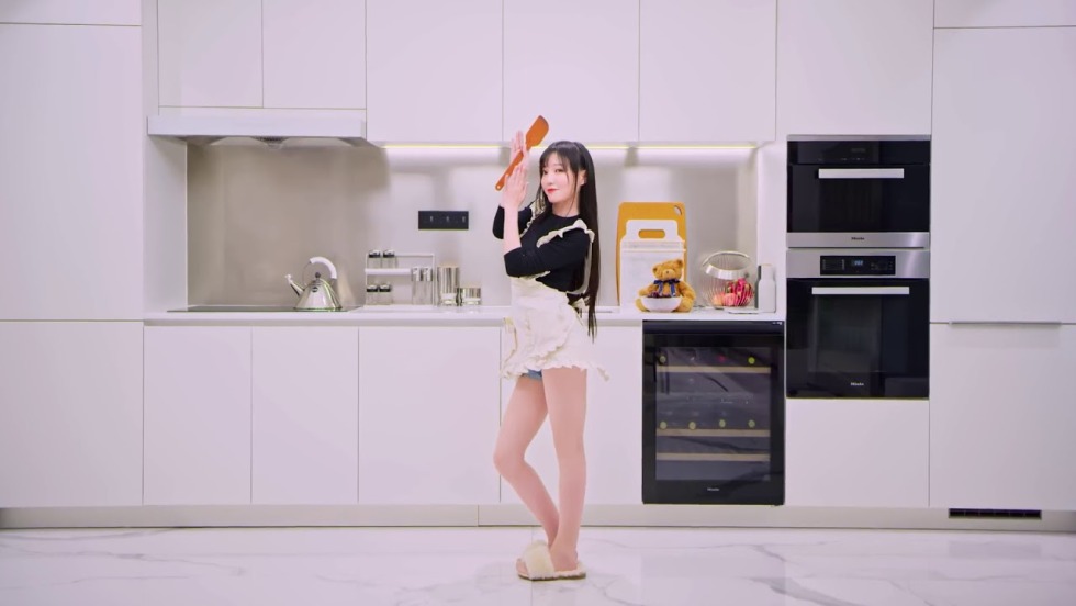 The girl licks the side of the side