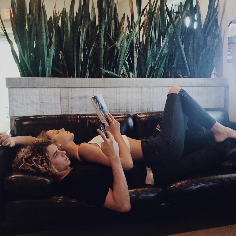 Girl in a black swimsuit in the pool