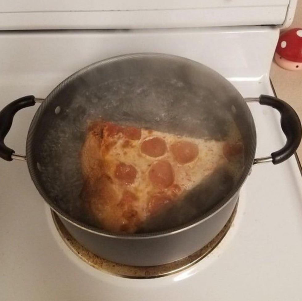 Boiled pizza in a pan
