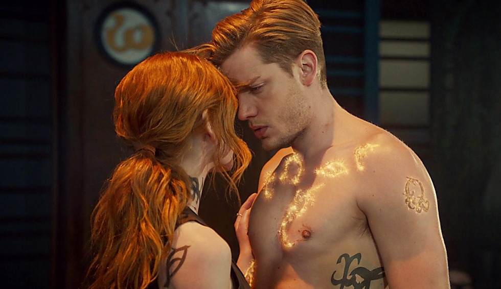 Dominic Sherwood and Katherine McNamara Kiss