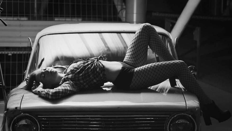 Girl on the hood of Lada