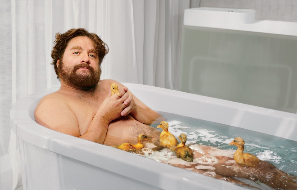 Zach Galifianakis with a child