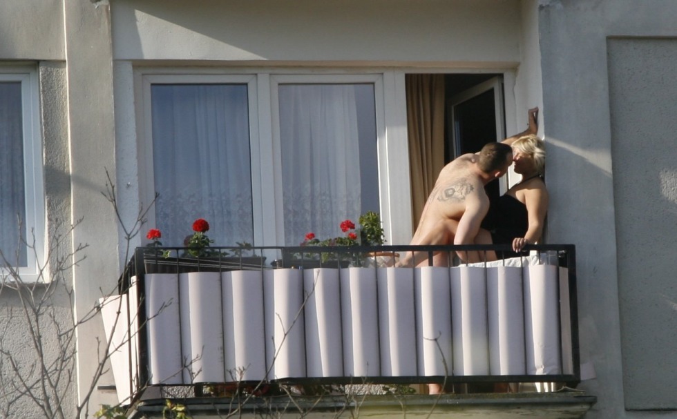 Naked woman on the balcony Private