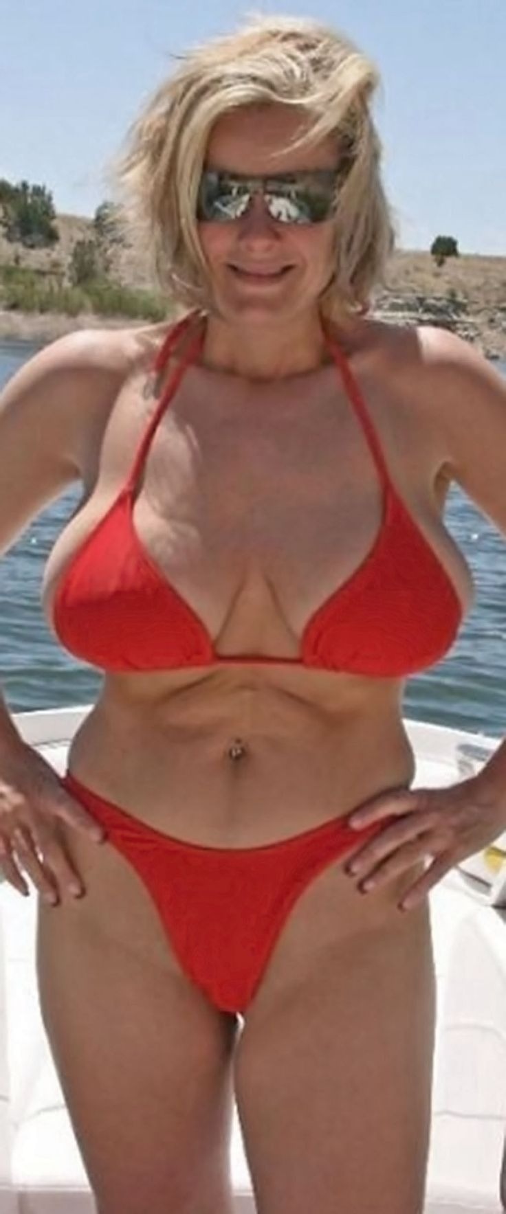 Porno Mamas with Huge Mammas in A Micro Bathing Suit (76 photos)