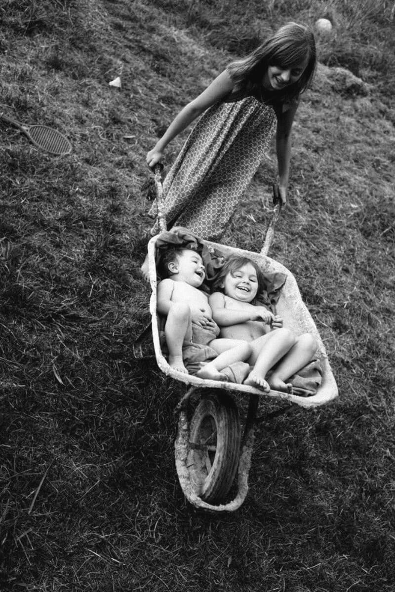 Adult daughter on the beach in a swimsuit