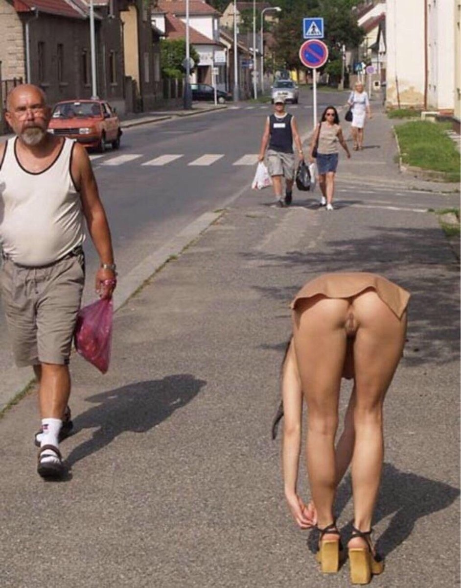 Elderly in a skirt without panties