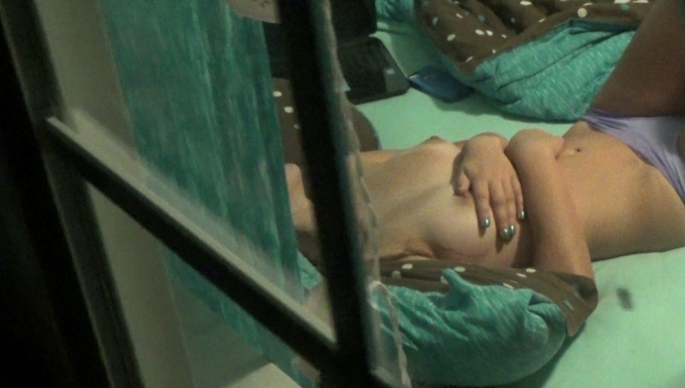 Sunbathing on the balcony naked