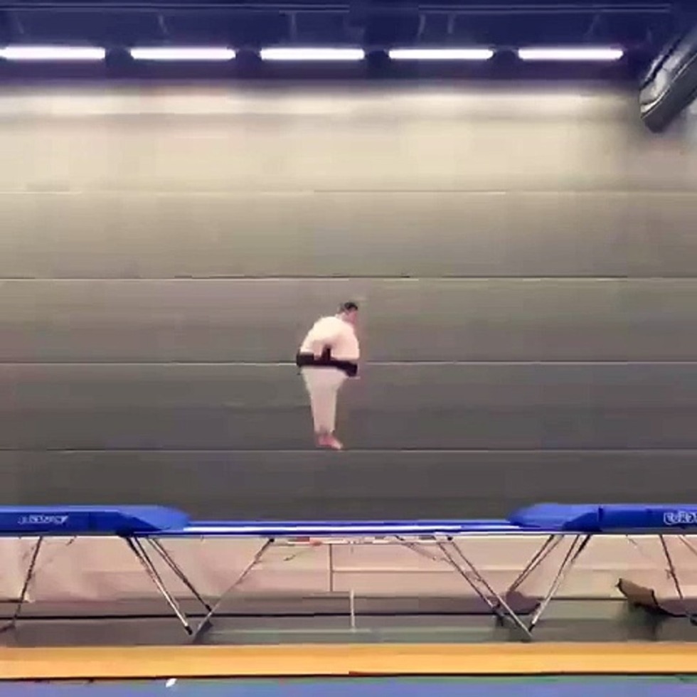 Naked women jump on a trampoline