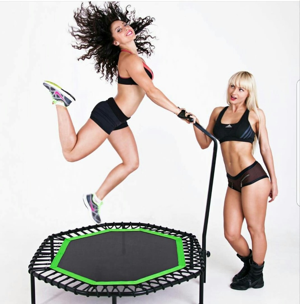 The girl is on a trampoline