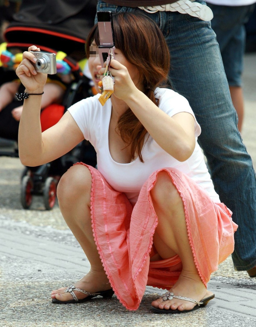 Big butt in panties under a skirt