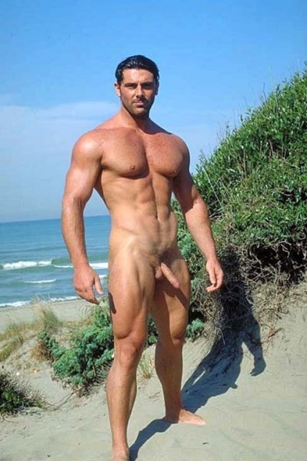 Standing penis on the beach