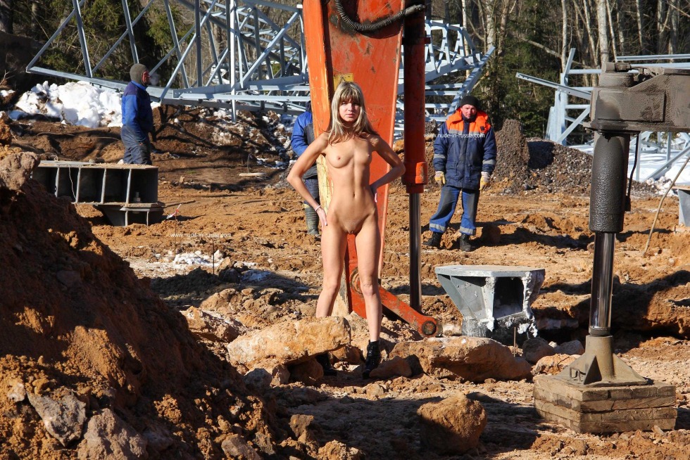 Naked girls at a construction site