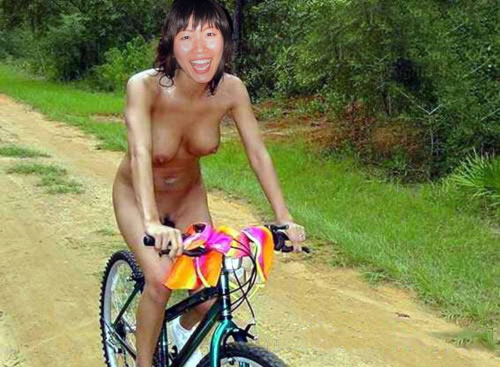 Naked without panties on a motorcycle