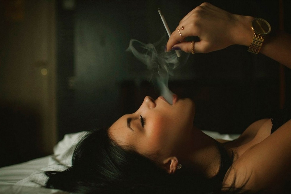 The girl smokes