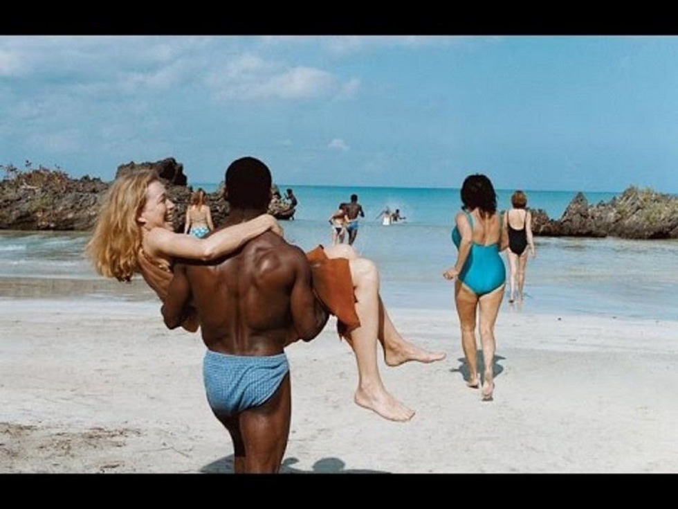 Naked white women with blacks on the beach