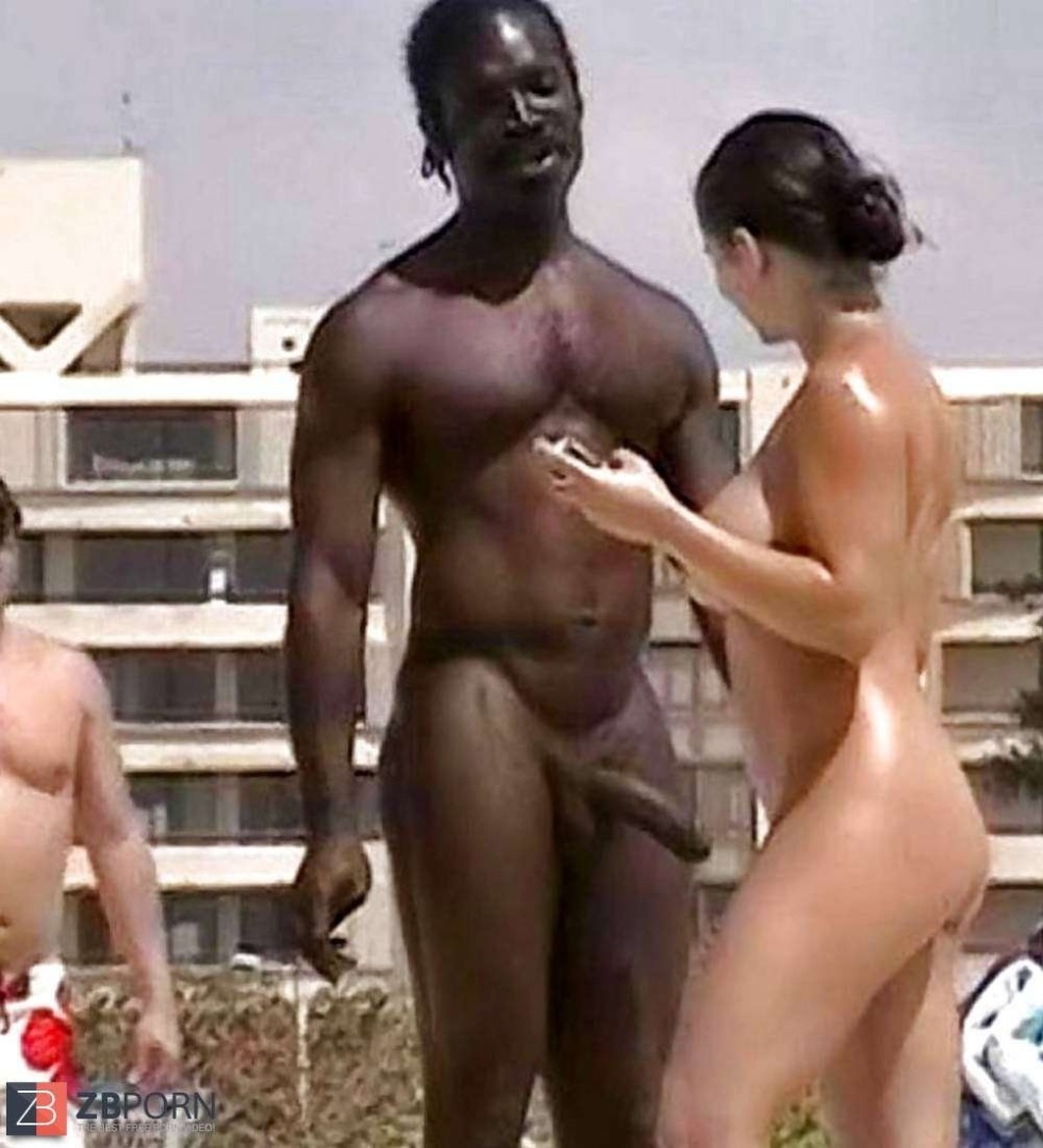 Naked white women with blacks on the beach