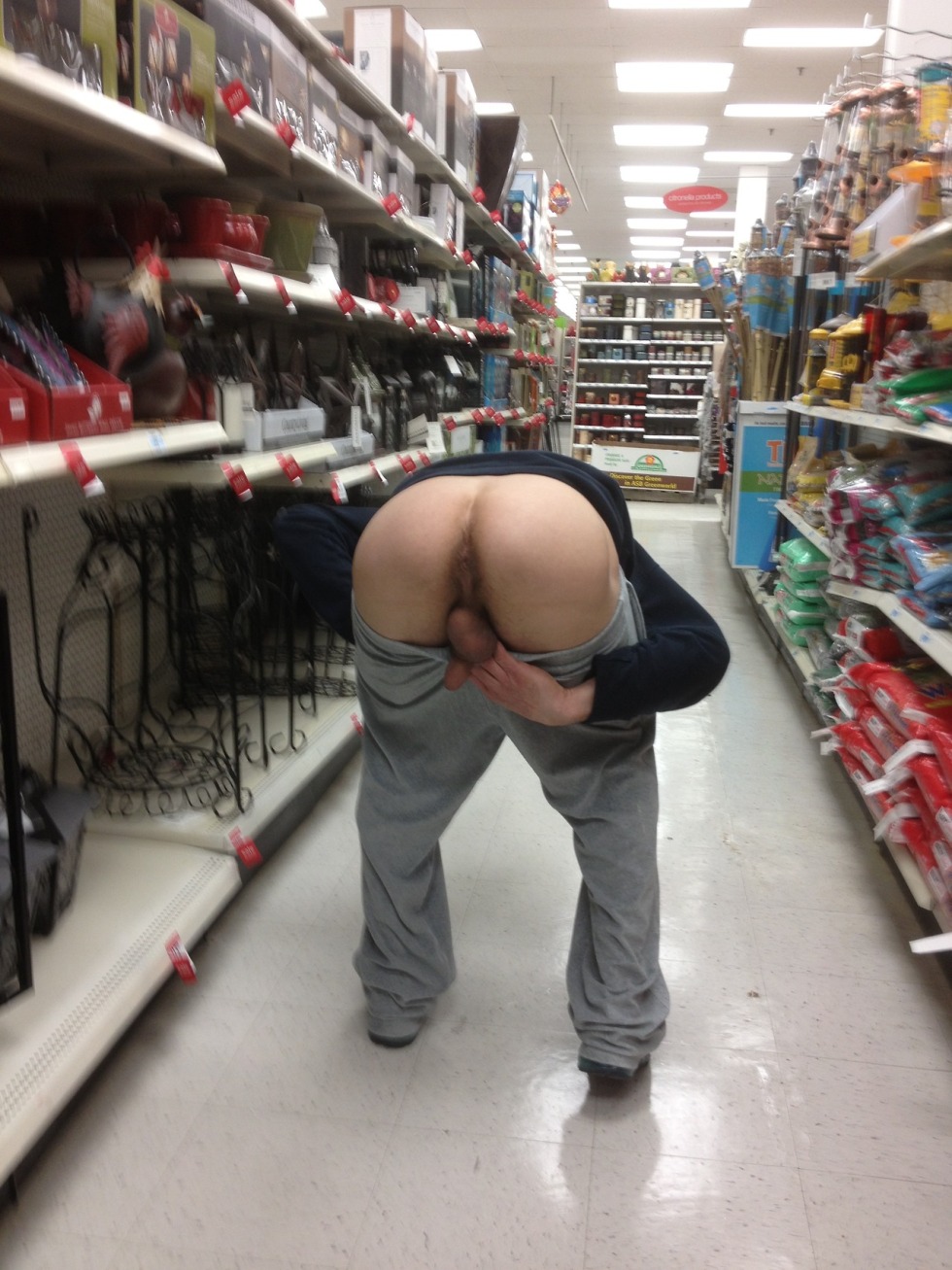 A naked woman bent down