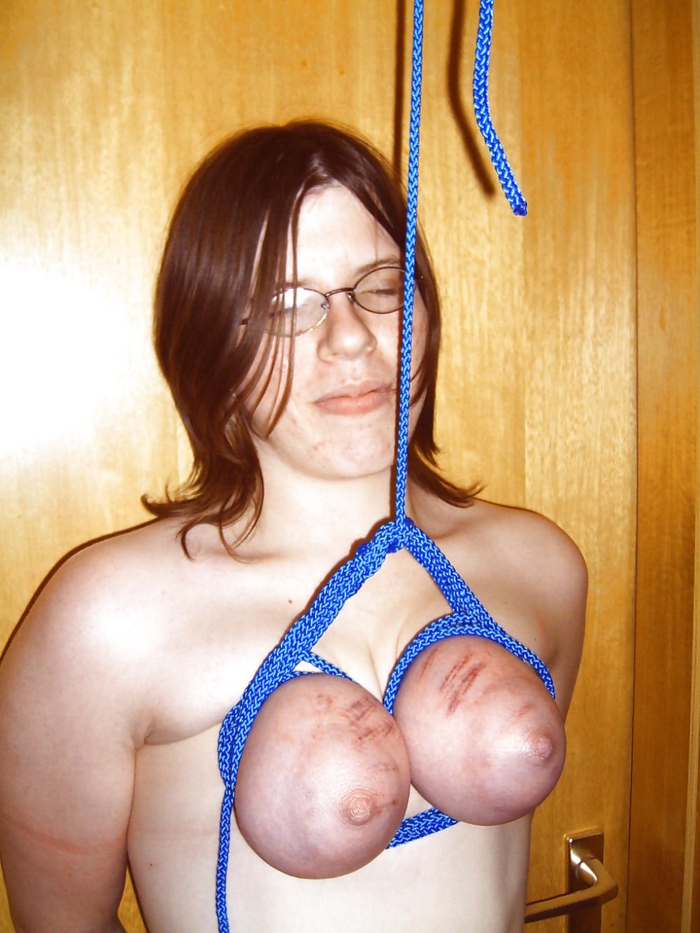 Hanged with big tits