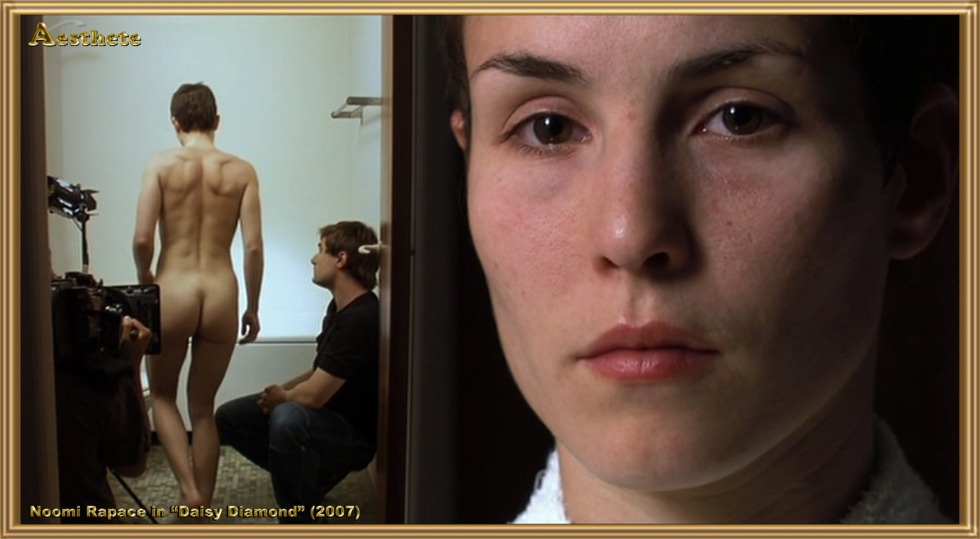 Naked Numi Rapas with a dragon tattoo