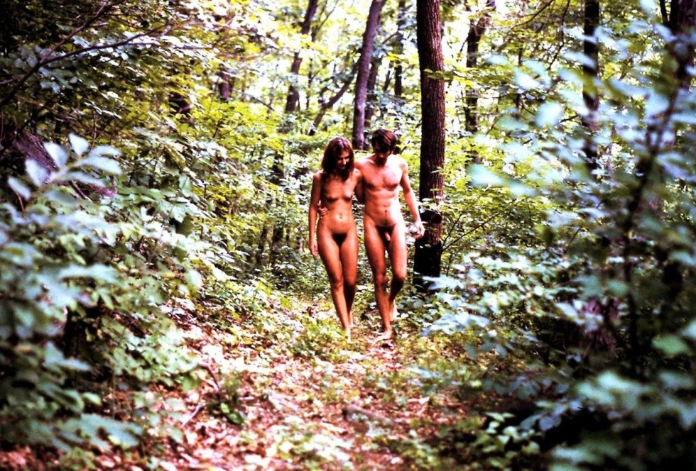 Naked woman is attached in the forest