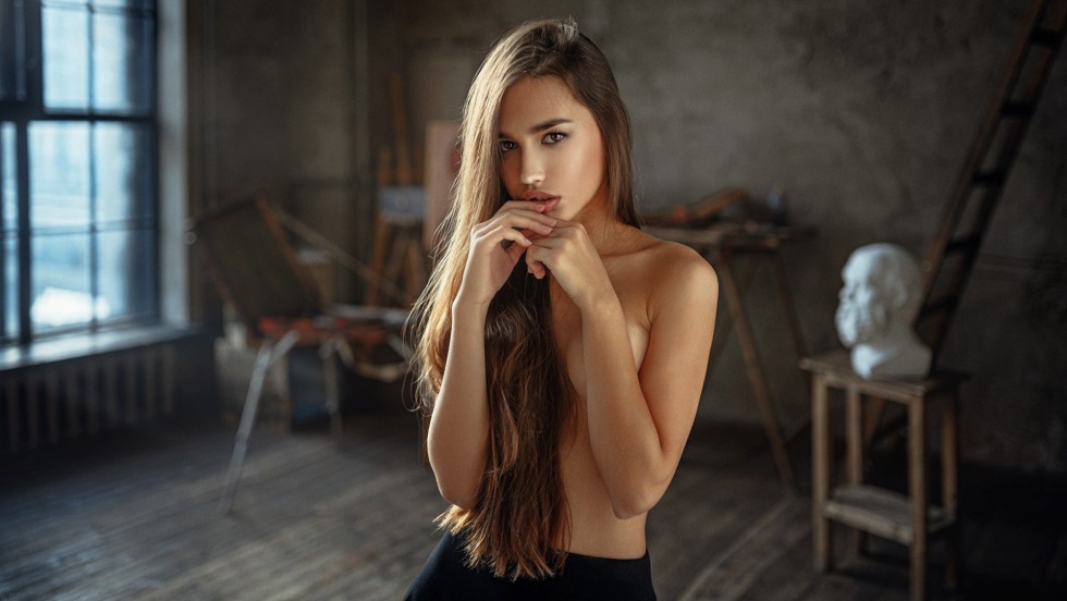 Beautiful girl in linen lies