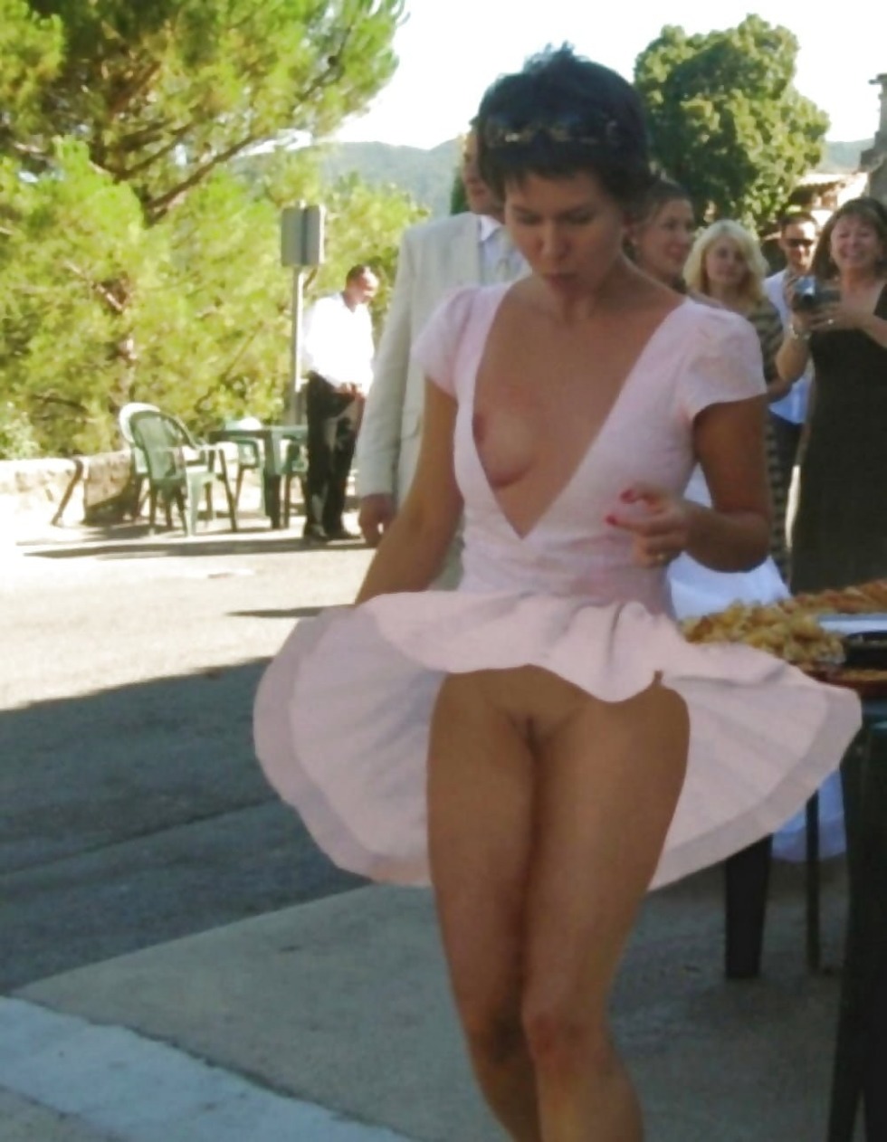 The wind lifts the skirts without panties