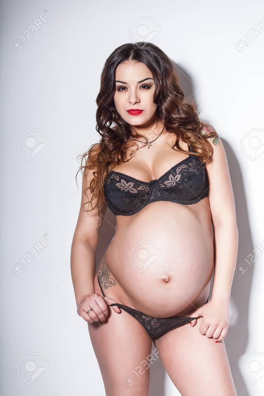 Pregnant in erotic linen naked