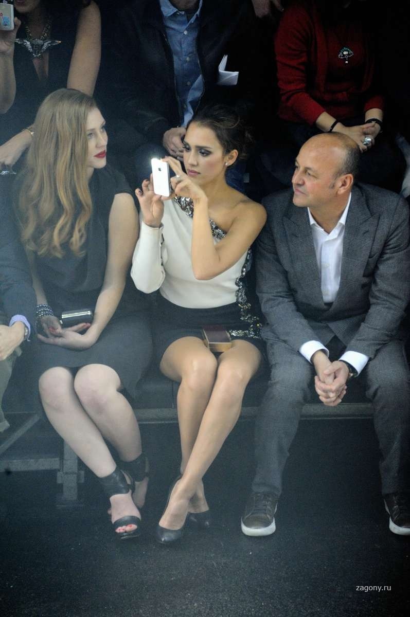 Women's legs in the auditorium