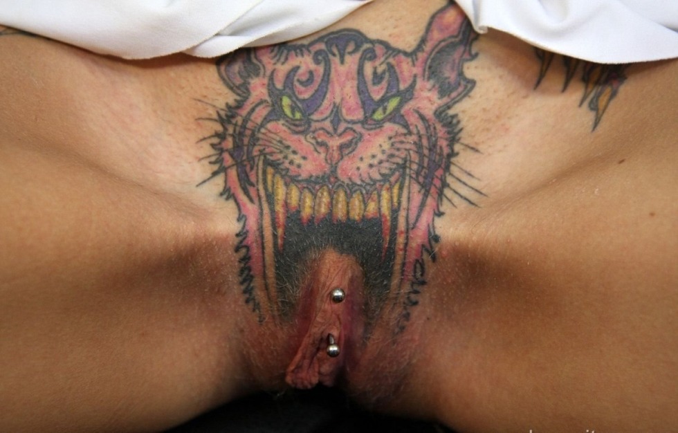 Women's intimate tattoo and piercing