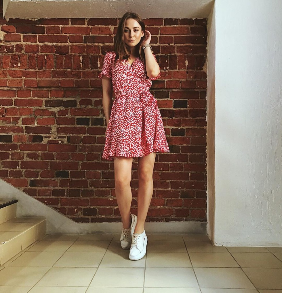 Ingrid Olerinskaya in a dress