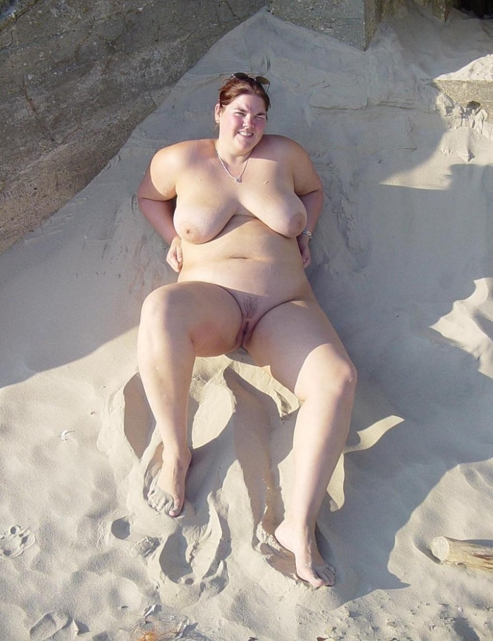 Naked mature fat people on the beach