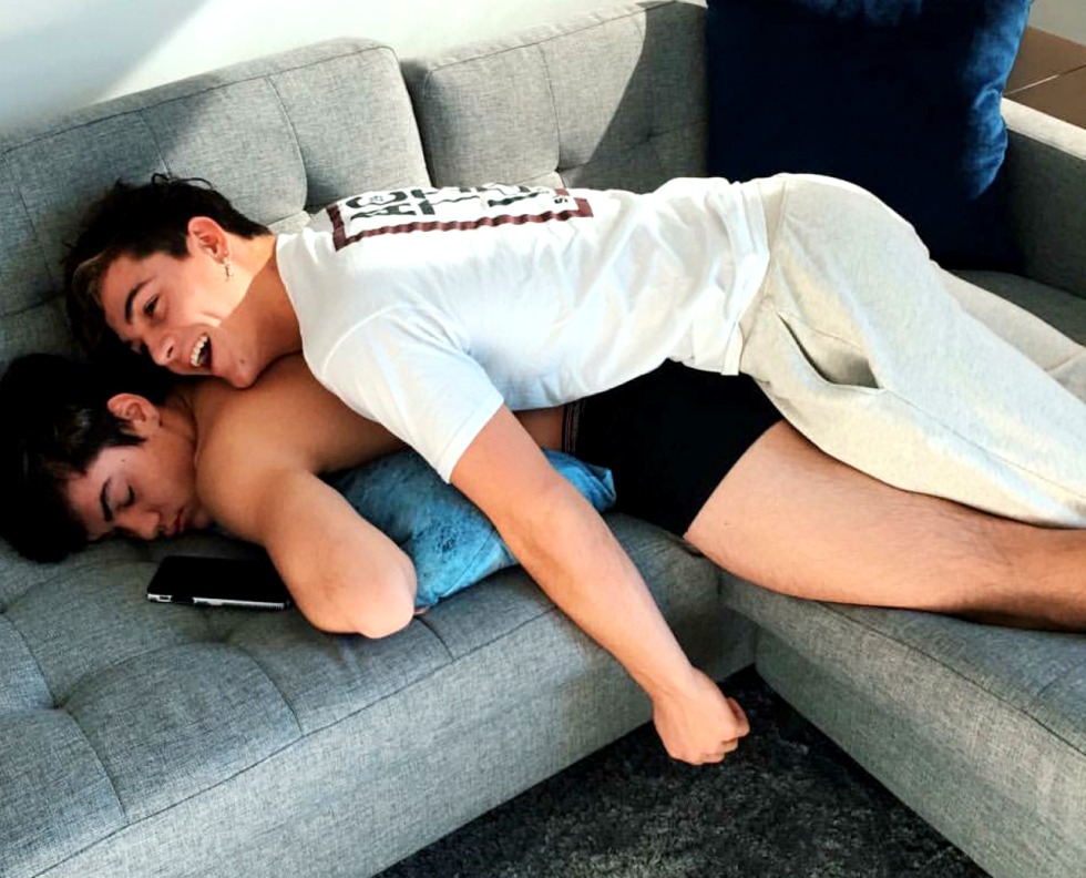 The guy is lying on a guy