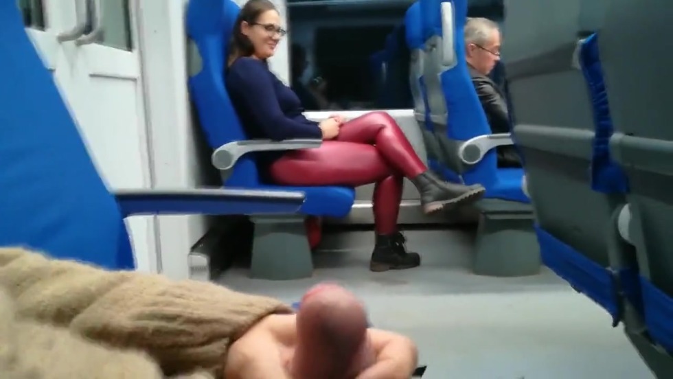 The girl watches the blowjob