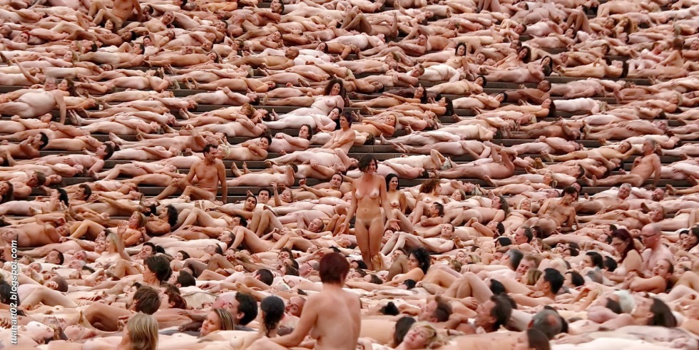 Naked men and women together