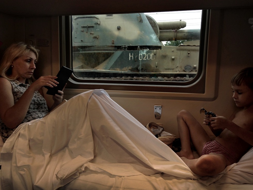 The girl undresses on the train