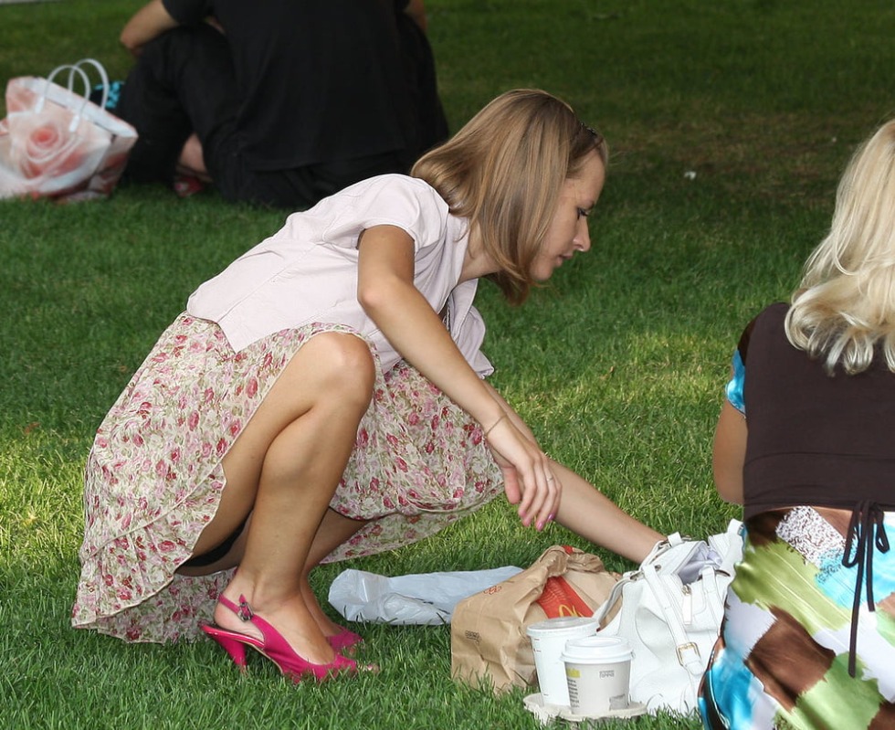 The girl shows a pussy on the street