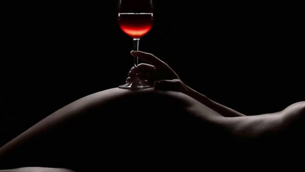 Erotic photo shoot with a glass