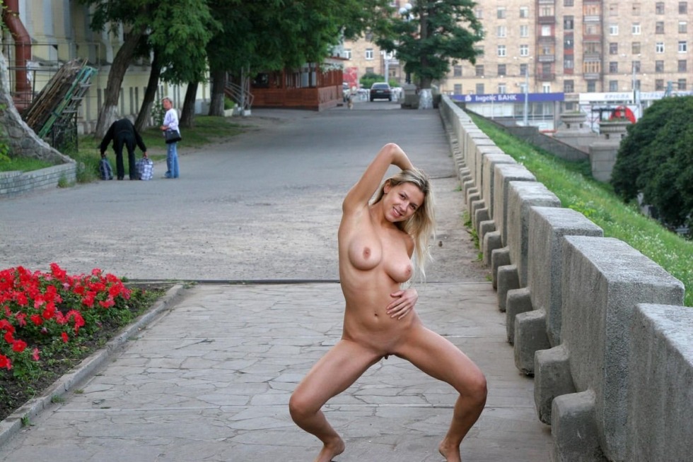 Naked woman walks down the street