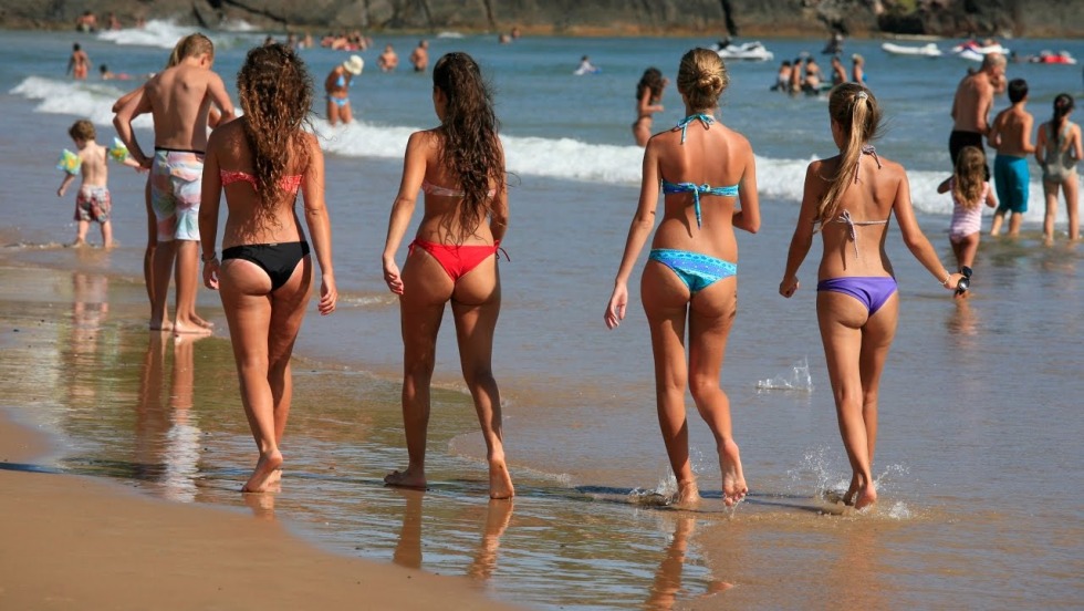 Virgin in a swimsuit on the beach