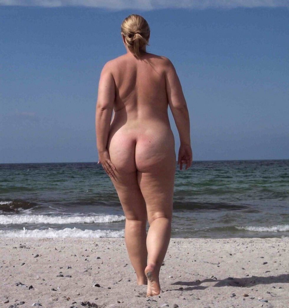 Naked women aged on the beach