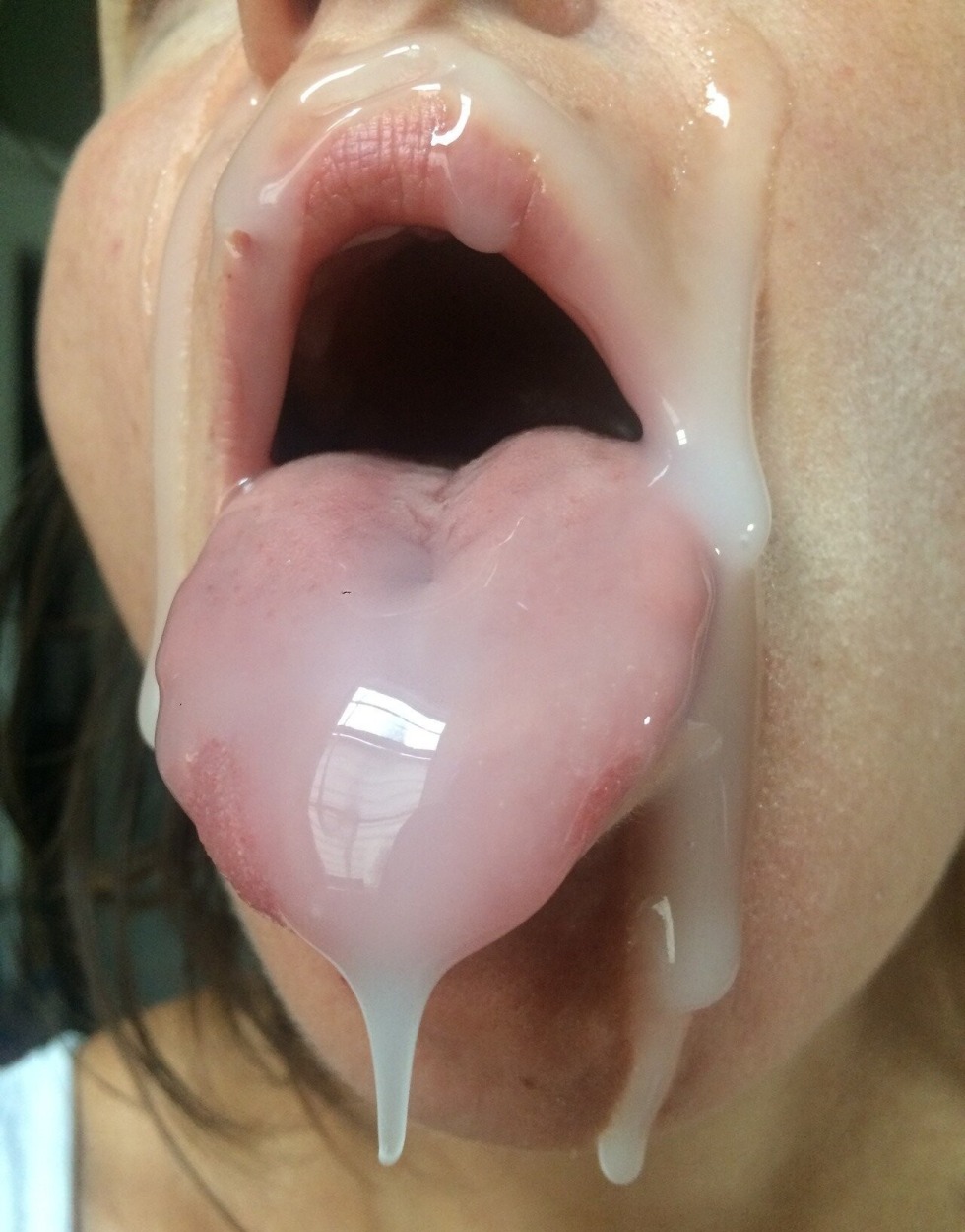 Cum in a close -up mouth