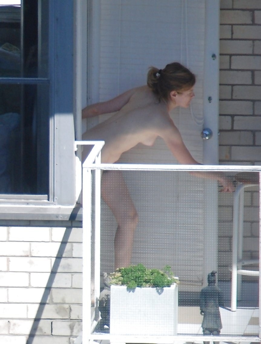 Peeping out the windows behind the naked