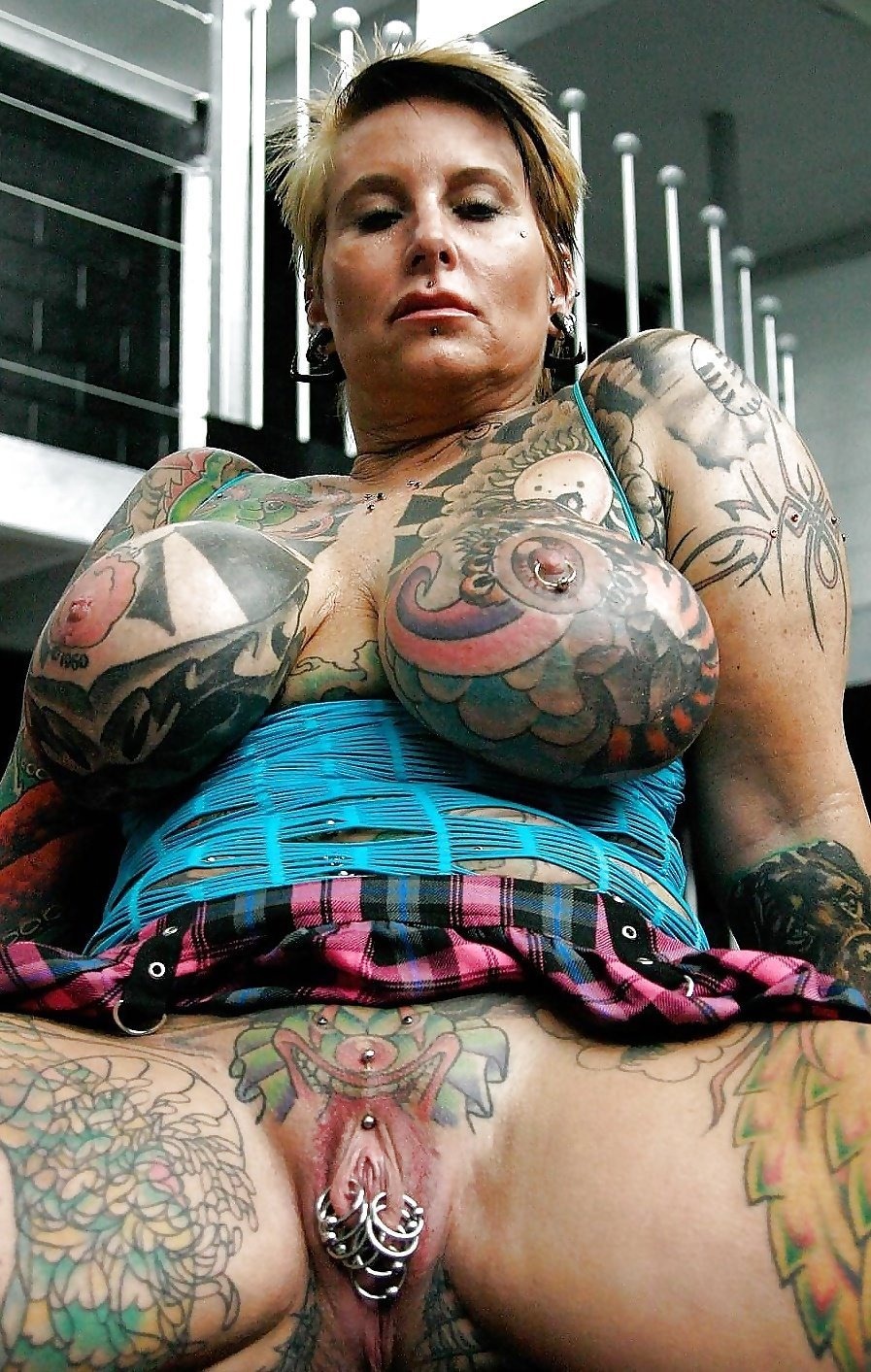 Naked girls with tattoo and piercing