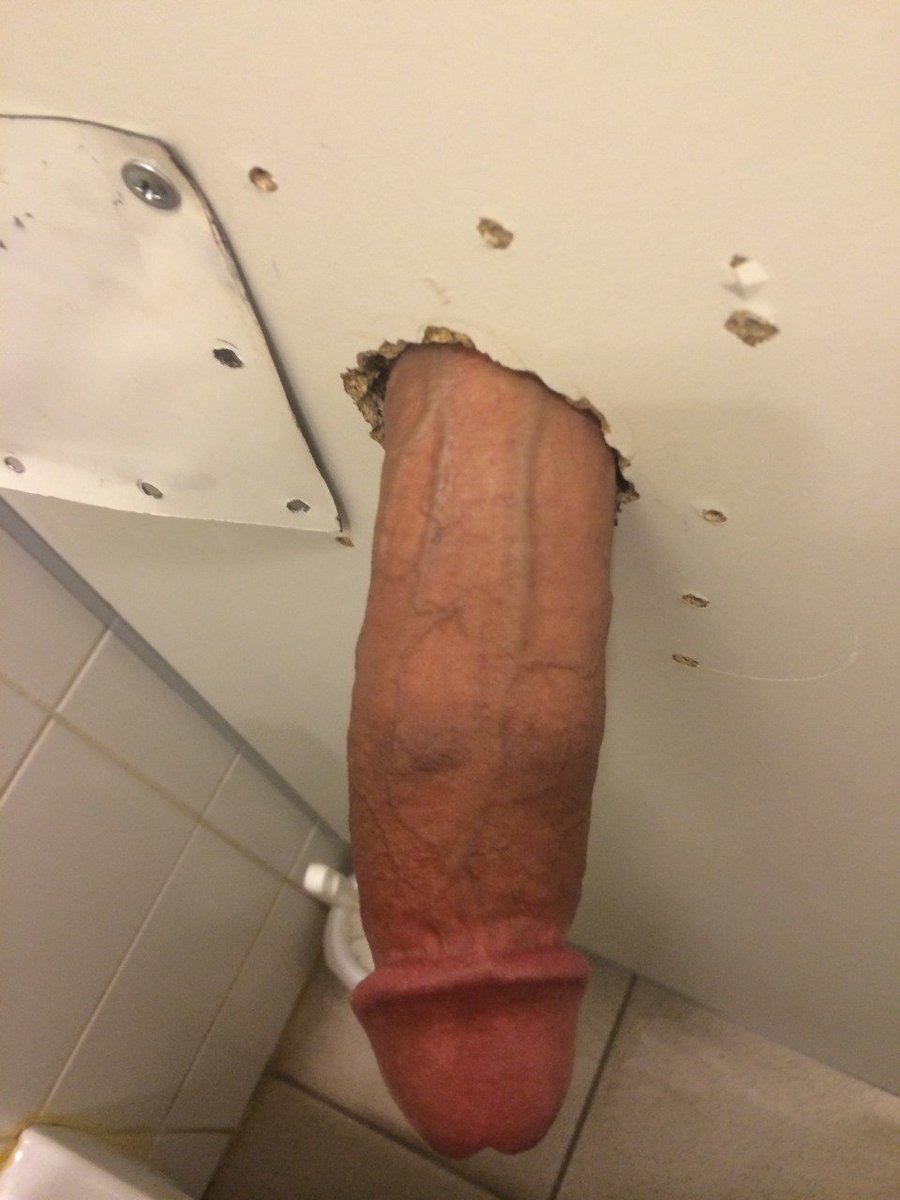 Dick sticks out of the hole in the wall