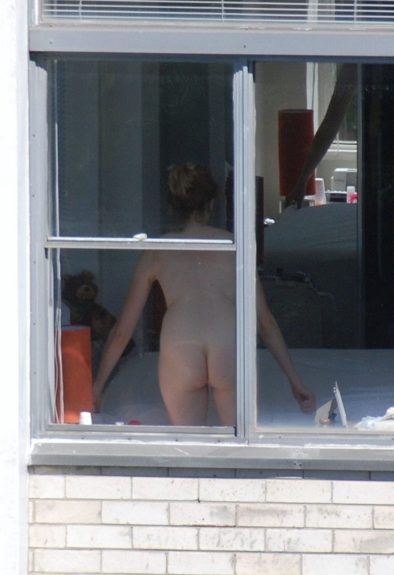 Naked women in the window is spied
